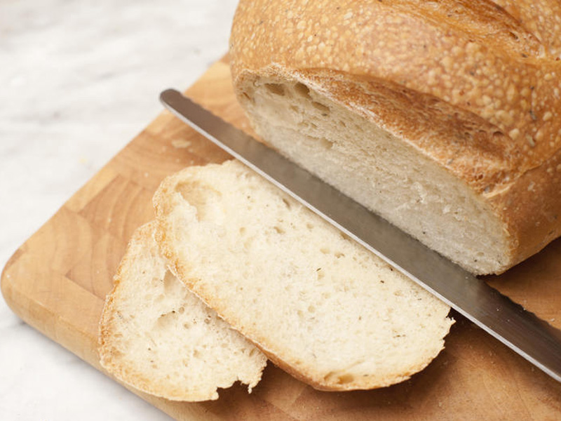 Slicing sourdough bread